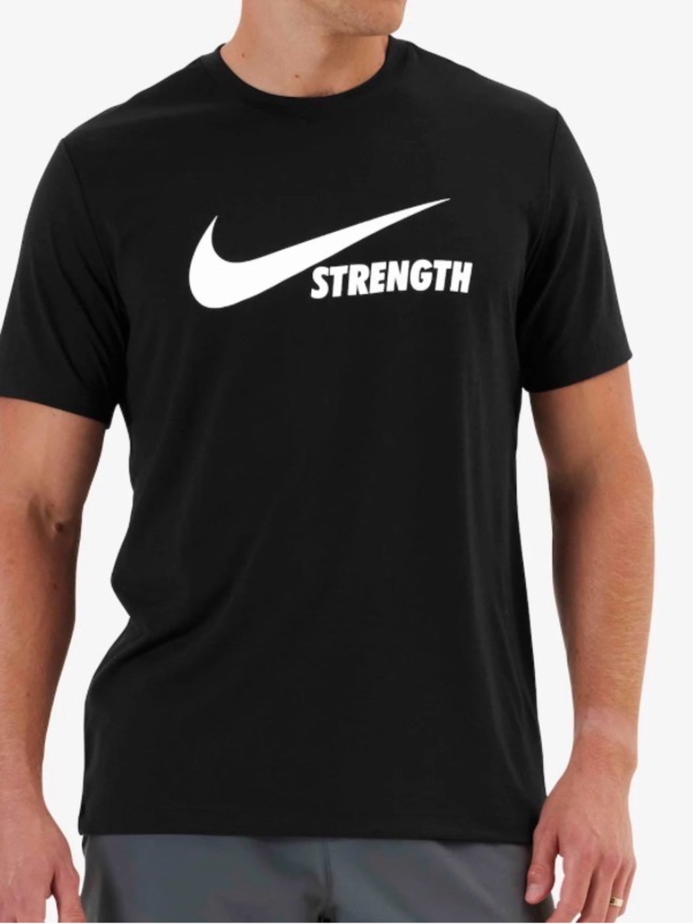Nike Men’s Black Tee with White Swoosh and "Strength" Graphic. Sz S. NWT